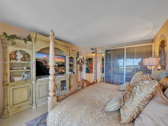 bedroom featuring concrete flooring