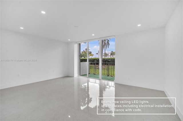 empty room with floor to ceiling windows