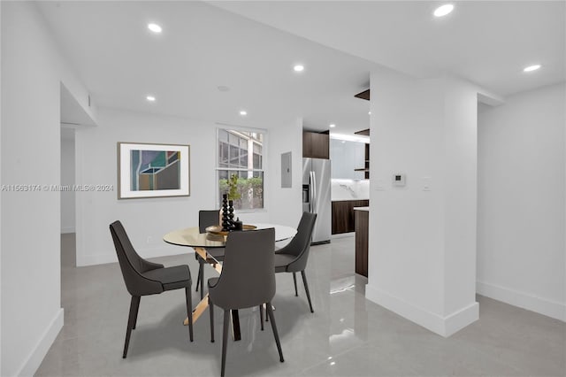 dining room with light tile floors