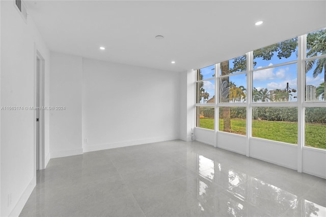 view of tiled spare room