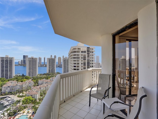 balcony featuring a water view