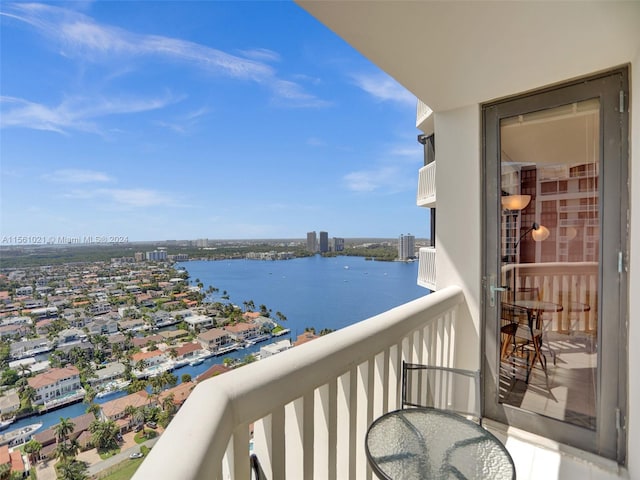 balcony featuring a water view