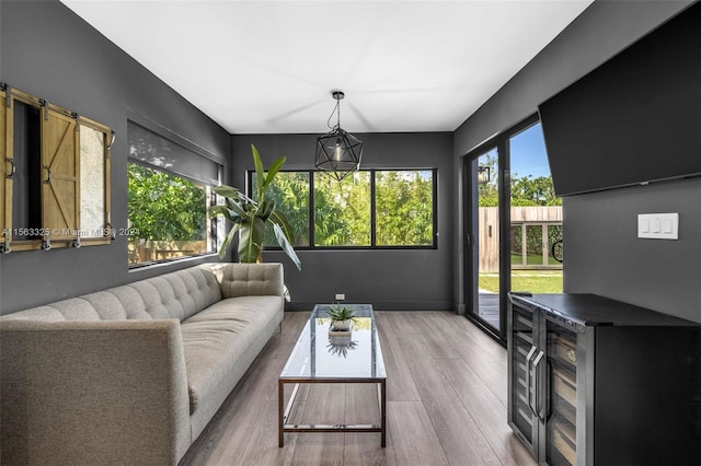 living room featuring baseboards and wood finished floors