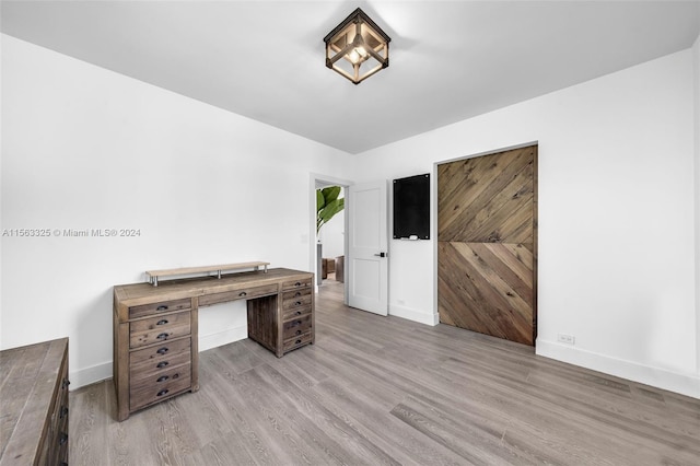 office area with hardwood / wood-style flooring