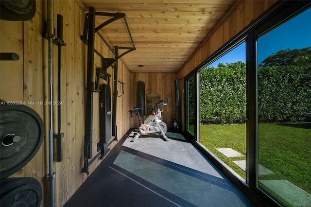 unfurnished sunroom with wooden ceiling