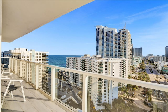 balcony featuring a water view