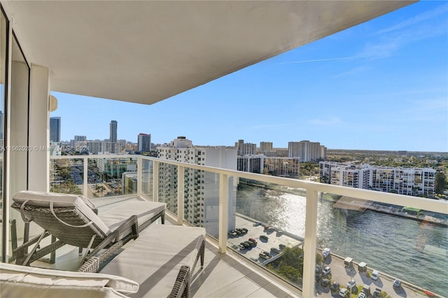 balcony featuring a water view