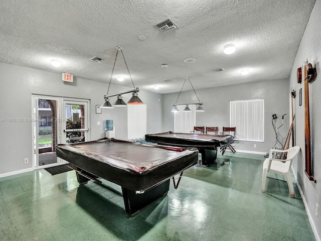 rec room featuring billiards, french doors, and a textured ceiling