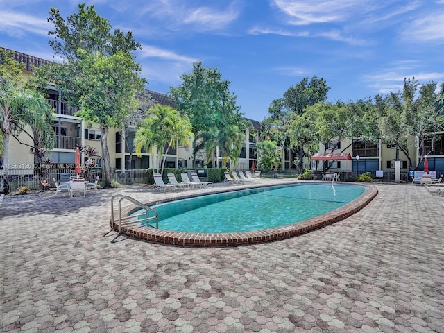 view of pool featuring a patio