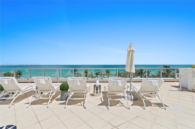 view of patio / terrace with a water view