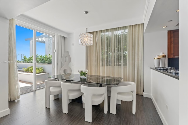 dining area featuring a chandelier