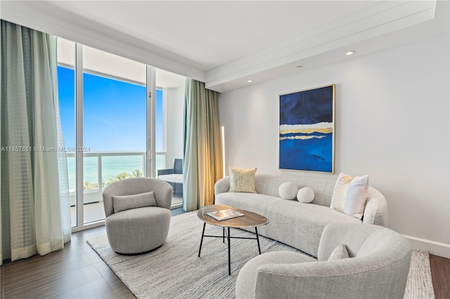 living room featuring a water view