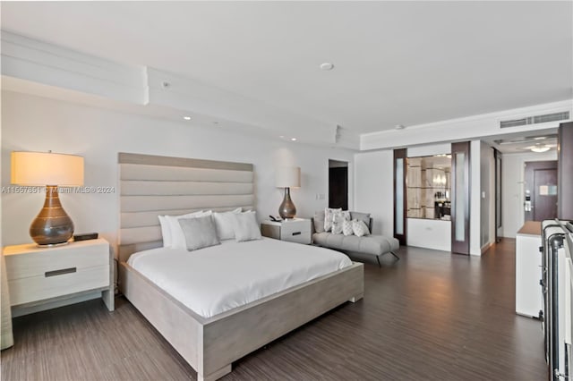 bedroom featuring dark hardwood / wood-style floors