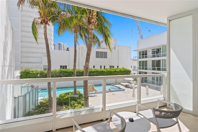 balcony with a community pool