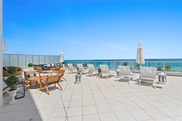 view of patio / terrace with a water view