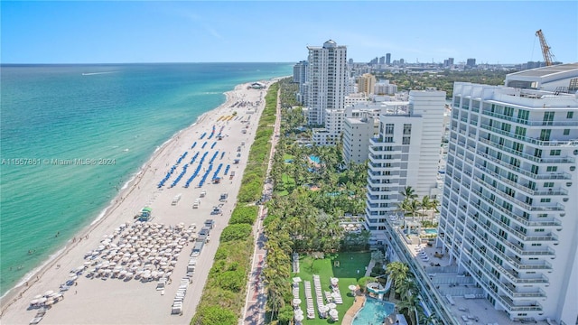 aerial view with a beach view and a water view