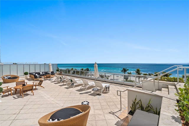 view of terrace featuring a water view