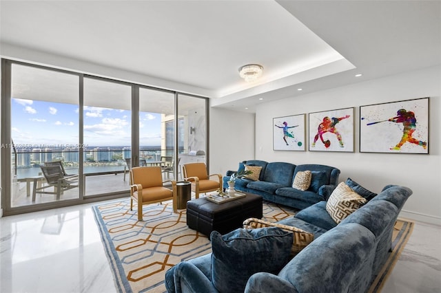 tiled living room with floor to ceiling windows