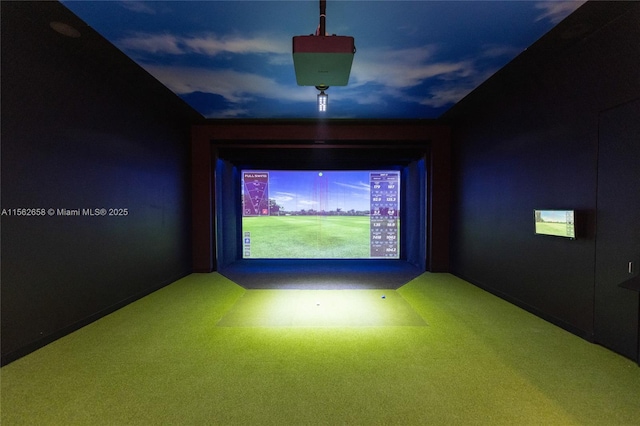 home theater room featuring golf simulator and carpet flooring