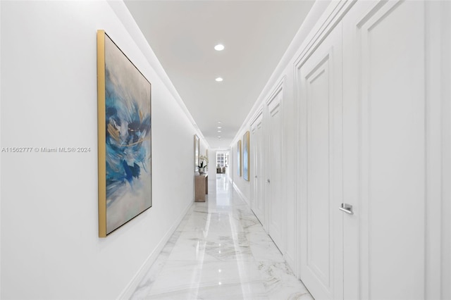 hallway featuring crown molding