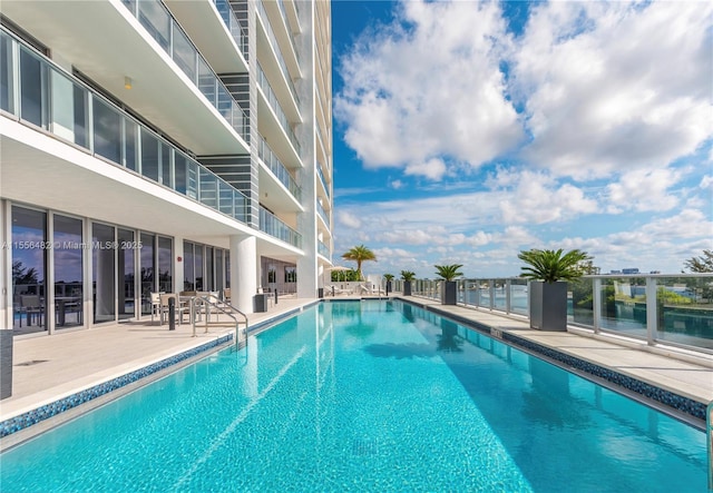 pool featuring a patio area