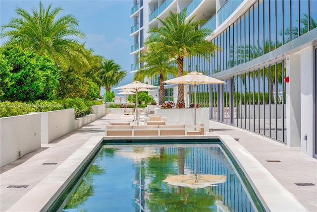 outdoor pool featuring a patio