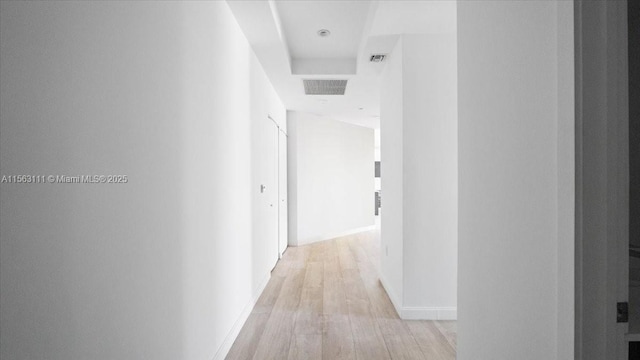 hallway featuring light wood-type flooring