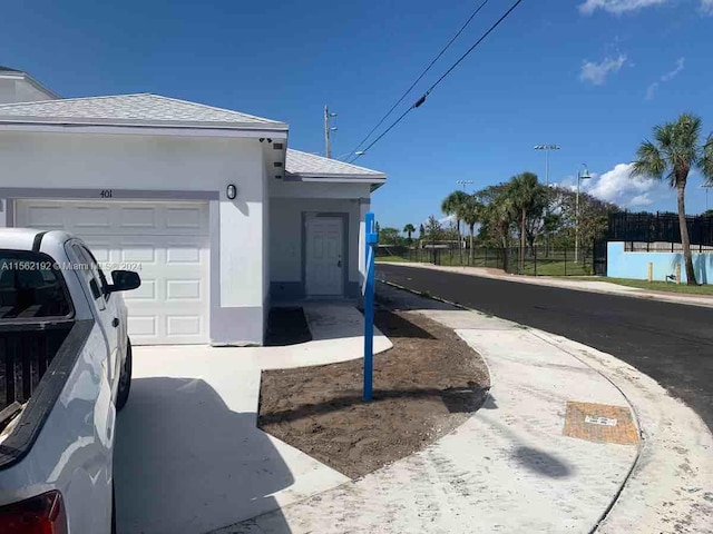 exterior space featuring a garage