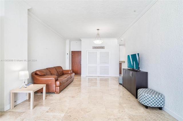 tiled living room with a textured ceiling and crown molding