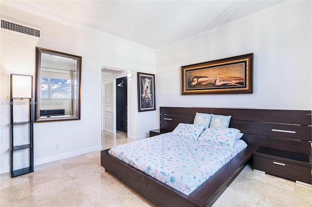 bedroom featuring crown molding and light tile floors