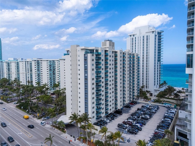 view of building exterior with a water view