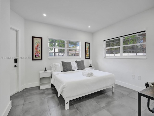 bedroom featuring tile flooring