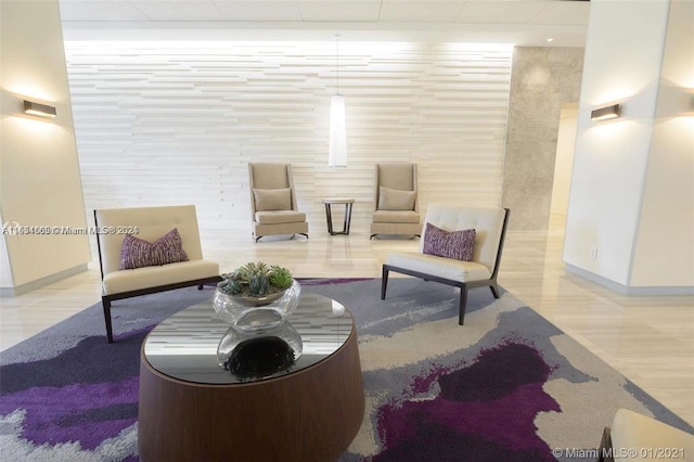 sitting room featuring light hardwood / wood-style flooring