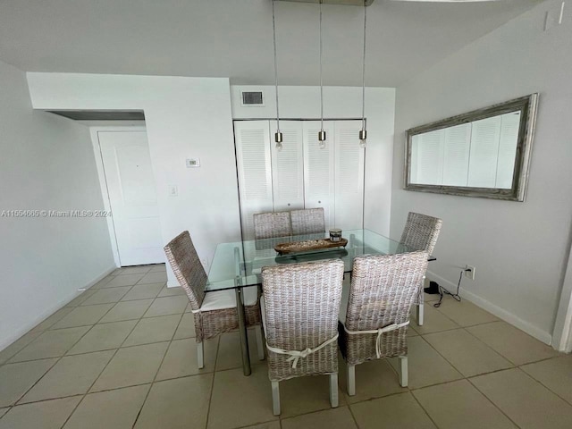 dining room featuring light tile flooring