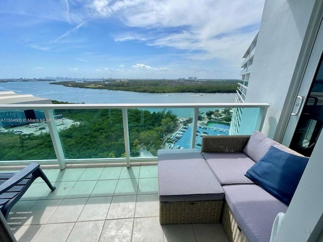 balcony featuring a water view