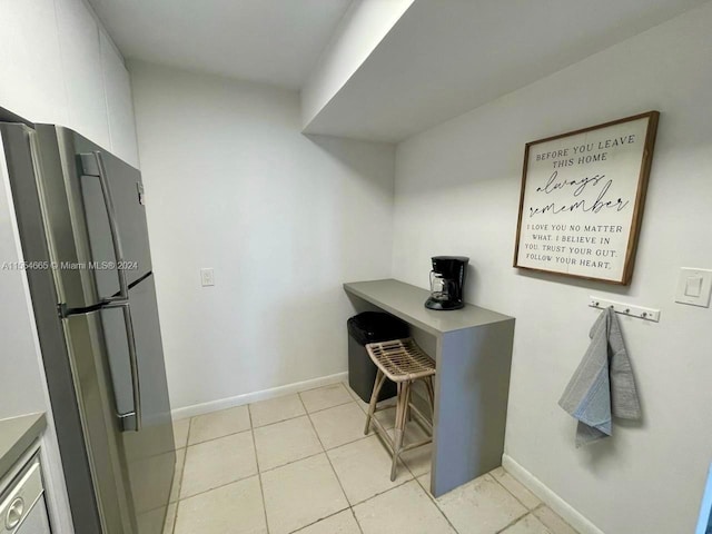 home office with light tile floors