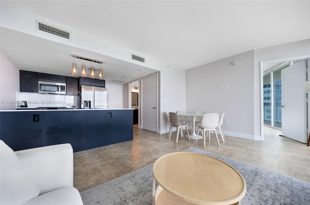 living room with sink