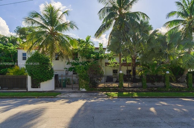 1051 NE 89th St, Miami, FL 33138 - view of front of property featuring a fenced front yard and stucco siding