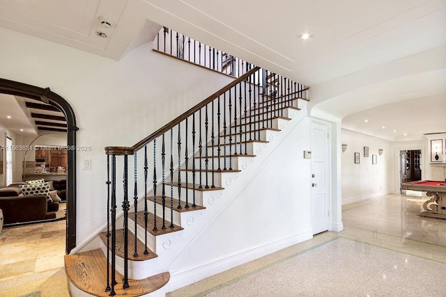 1051 NE 89th St, Miami, FL 33138 - stairs with baseboards, recessed lighting, arched walkways, and speckle patterned floor
