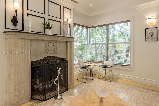 interior space featuring plenty of natural light and crown molding