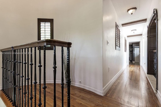 hallway with dark wood-type flooring