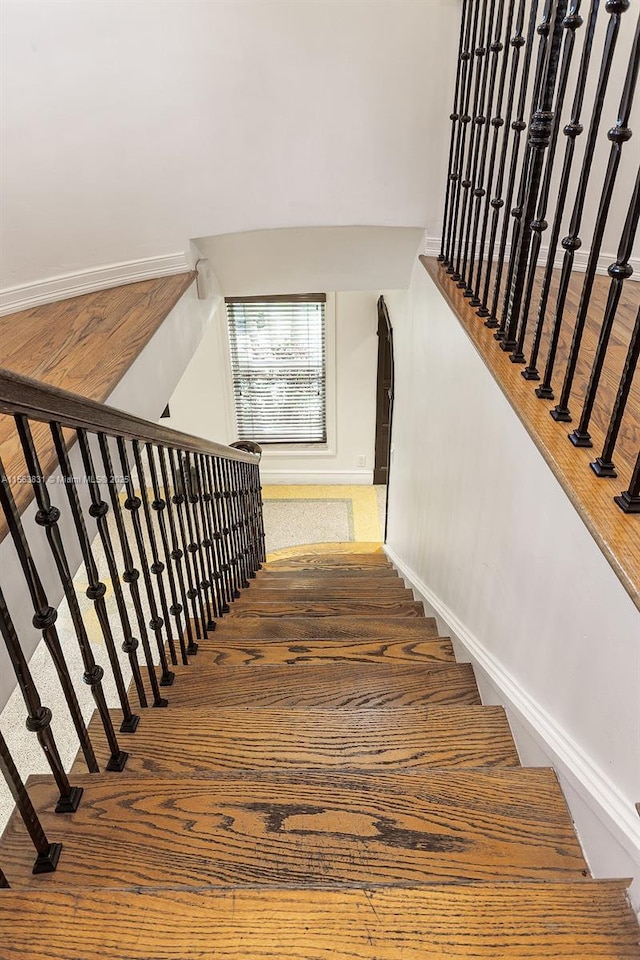 1051 NE 89th St, Miami, FL 33138 - staircase featuring baseboards and carpet floors
