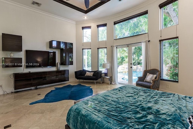 bedroom with crown molding, access to exterior, and a towering ceiling