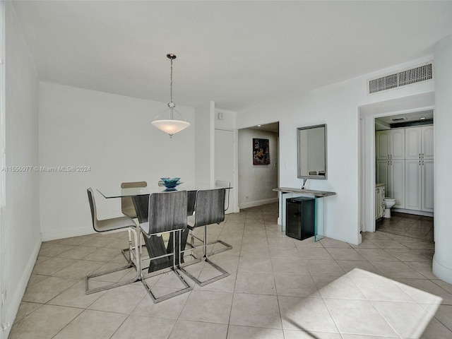 dining area with light tile floors