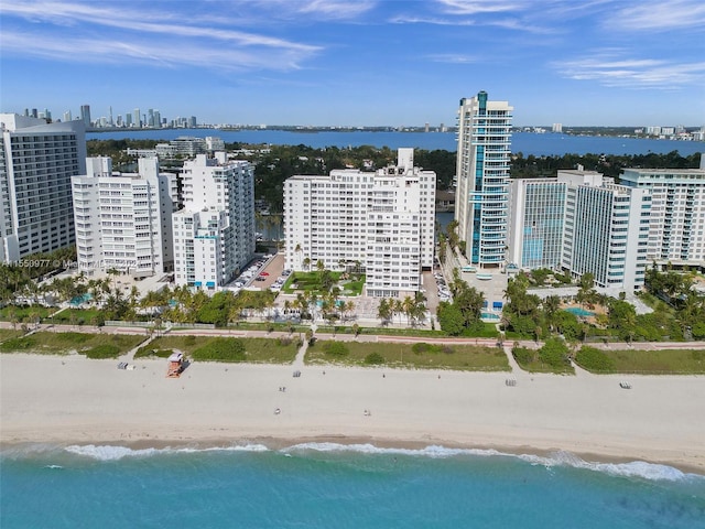 aerial view featuring a beach view and a water view