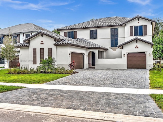 10456 SW 57th Ct, Cooper City, FL 33328 - mediterranean / spanish house with a garage and a front lawn