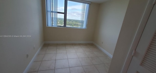 view of tiled spare room