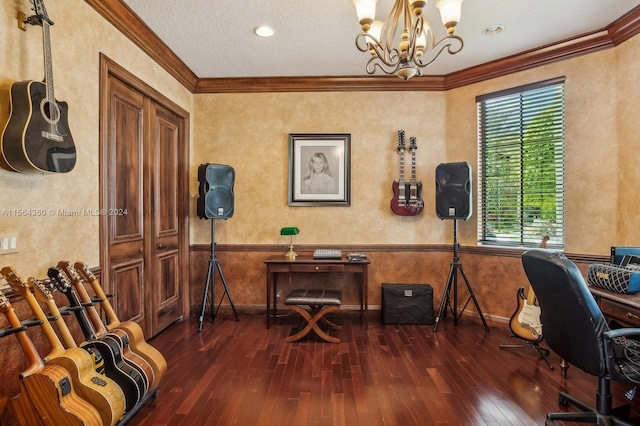 office space featuring hardwood / wood-style floors, ornamental molding, and an inviting chandelier