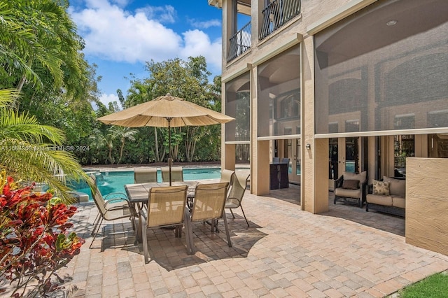 view of patio / terrace featuring a balcony