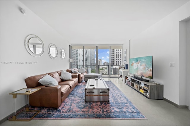 living room with floor to ceiling windows